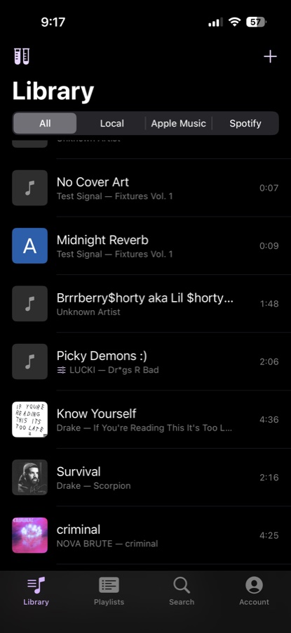 OmniMusik library showing local MP3s and Spotify tracks in one list